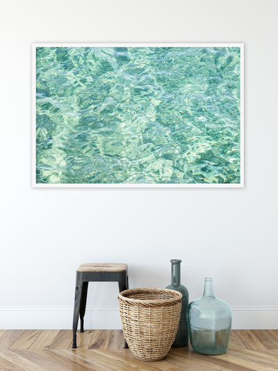 Large framed green abstract art print by Cattie Coyle Photography in modern coastal entryway