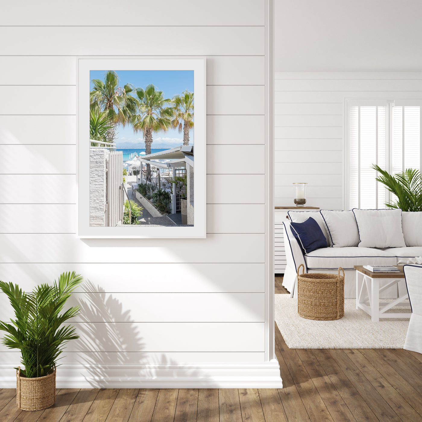 Beach wall art framed in coastal home by Cattie Coyle Photography