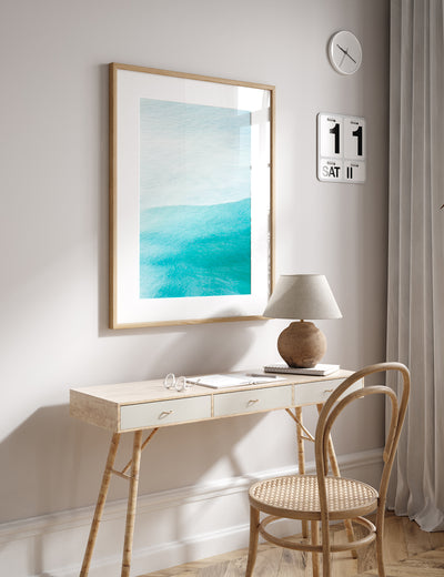 Abstract teal wall art by Cattie Coyle Photography above desk