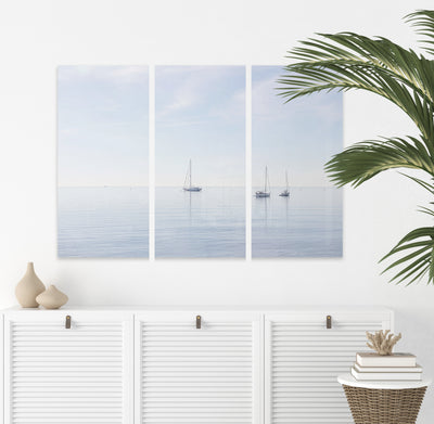 Boats No 6 - Coastal triptych by Cattie Coyle Photography above dresser