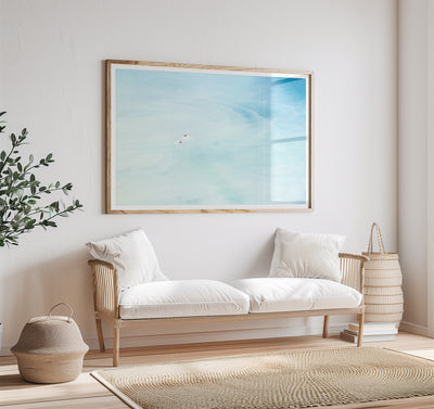 Swimming art print by Cattie Coyle Photography above couch