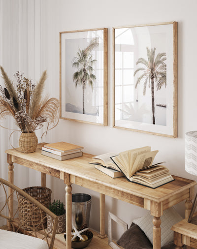 Palm tree prints by Cattie Coyle Photography above side table