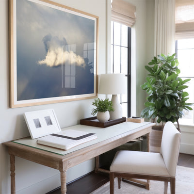 Storm cloud art print by Cattie Coyle Photography above desk