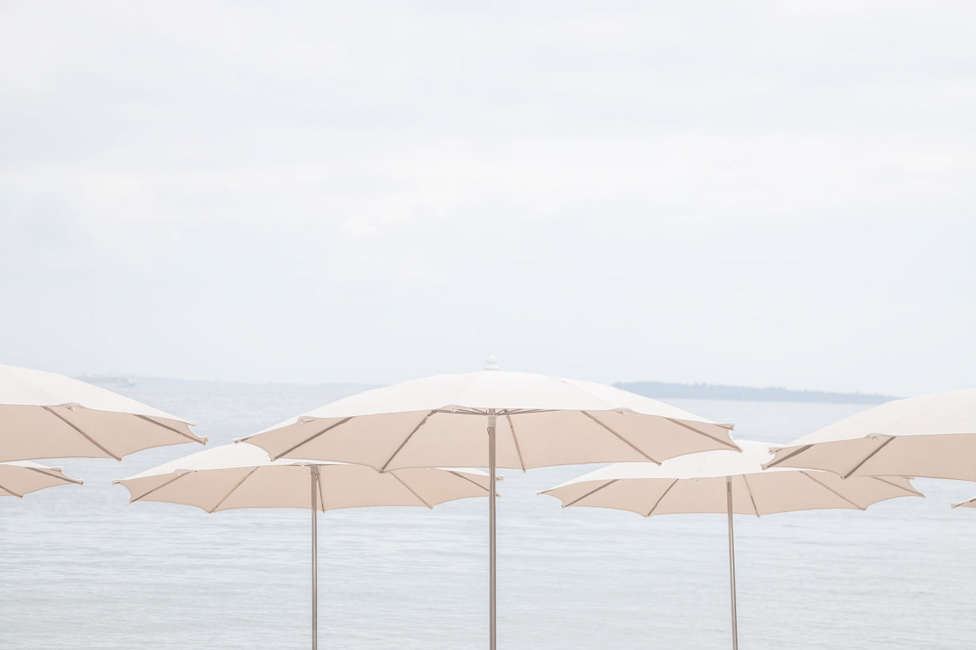 Beach umbrellas art print by Cattie Coyle Photography
