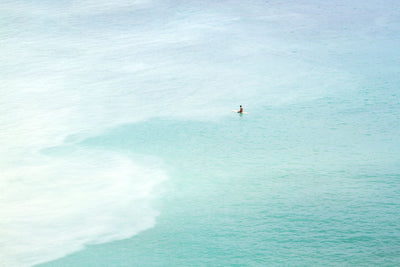 Magoito No 14 - Surfer and turquoise blue water aerial view fine art prints by Cattie Coyle Photography