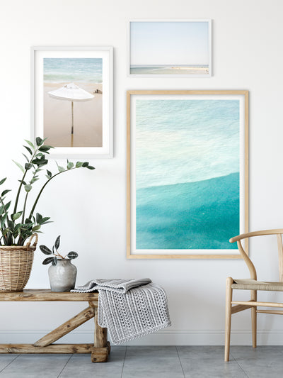 Coastal fine art prints on gallery wall by Cattie Coyle Photography