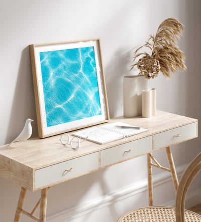 Swimming pool wall decor by Cattie Coyle Photography on desk