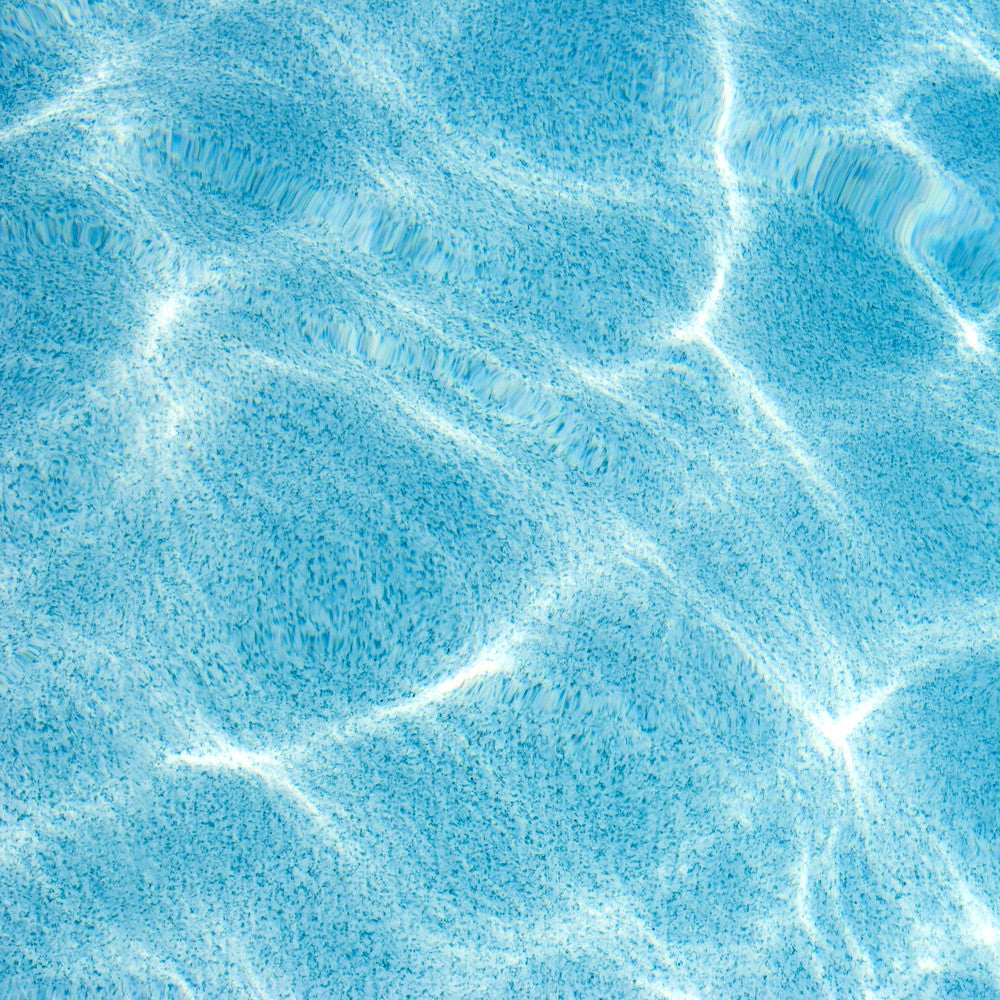 Swimming pool wall decor by Cattie Coyle Photography