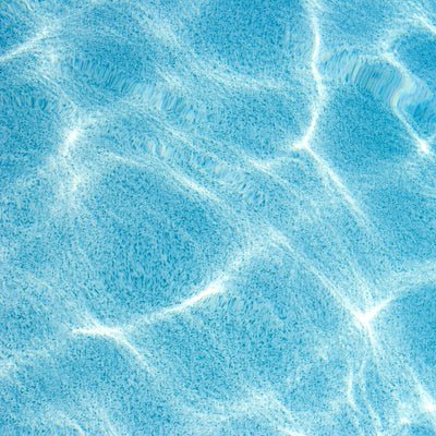 Swimming pool wall decor by Cattie Coyle Photography