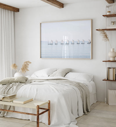 Large nautical wall art by Cattie Coyle Photography in bedroom