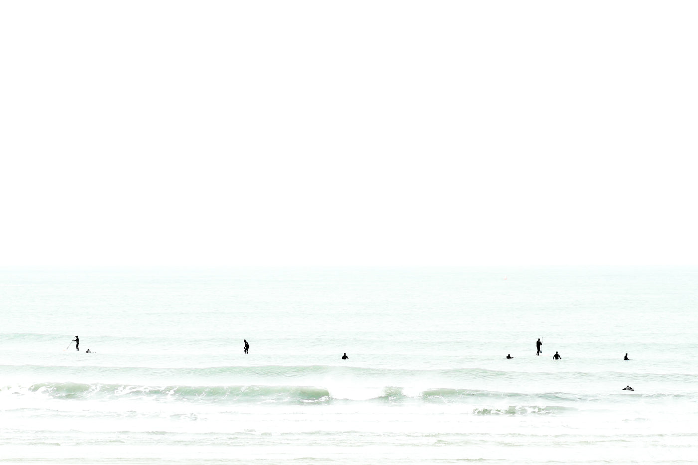 Surfers waiting for a wave - Fine art print by Cattie Coyle Photography